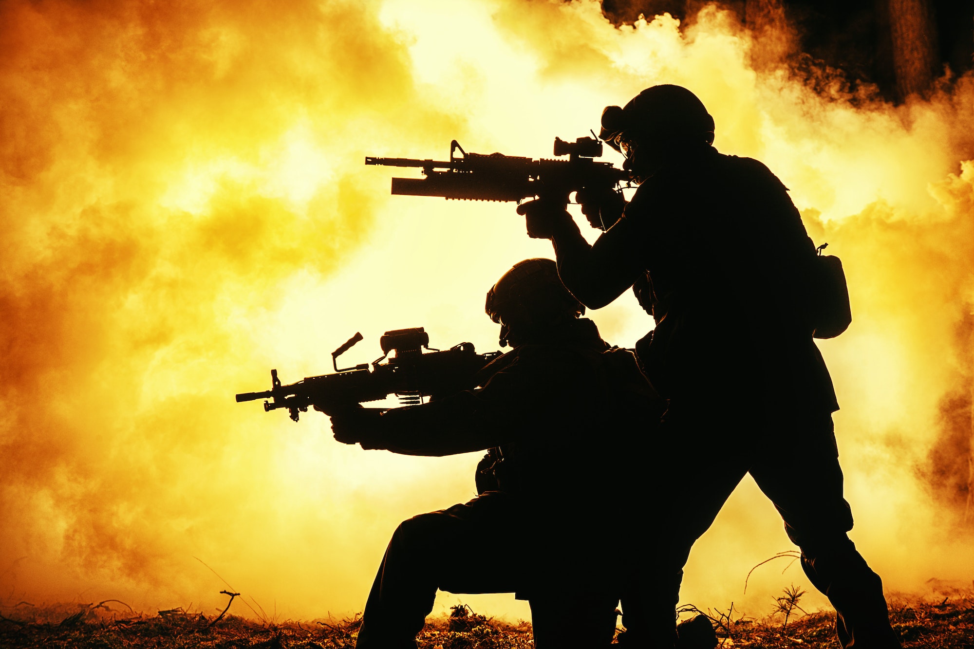 Black silhouettes of soldiers