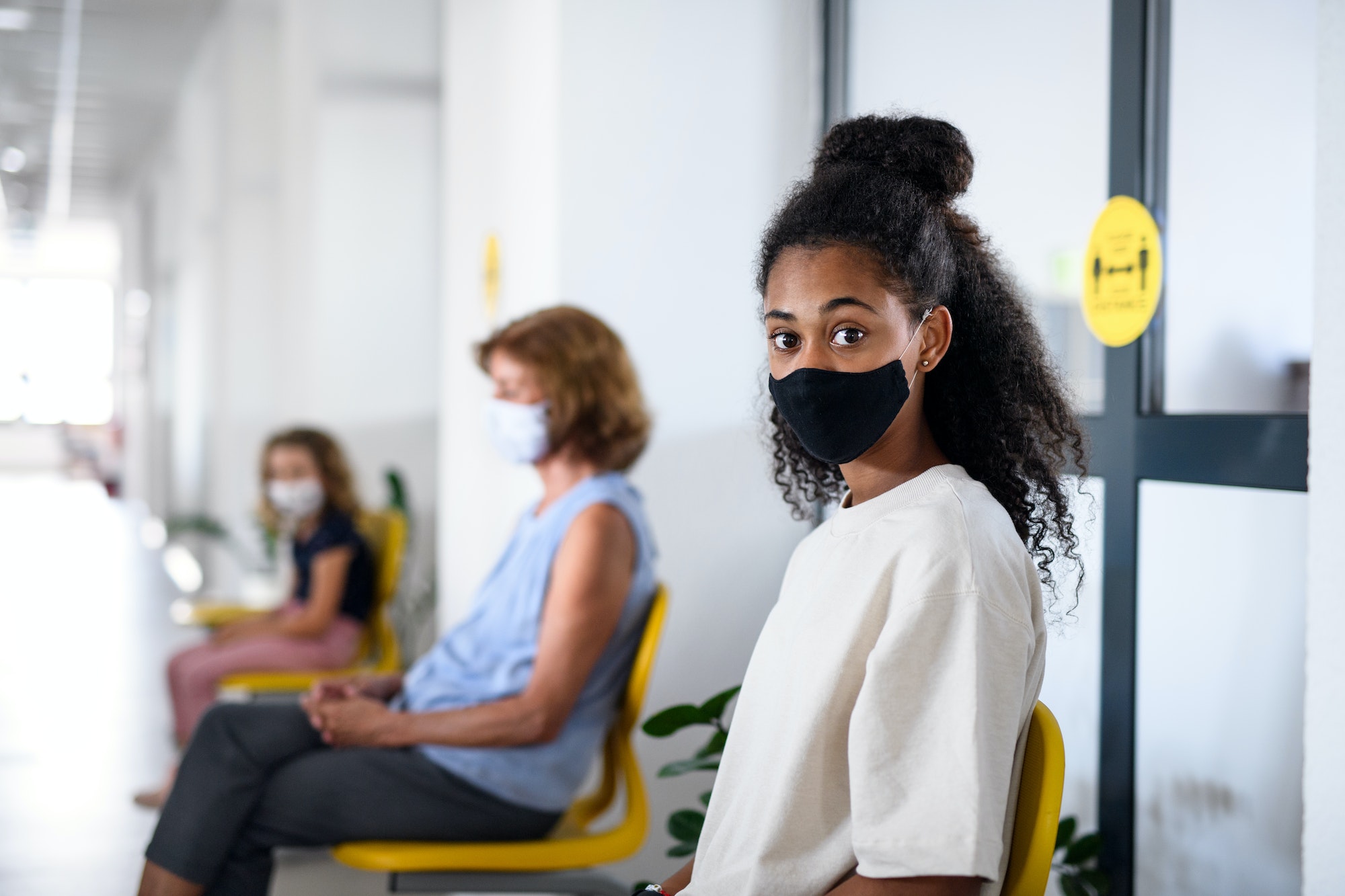 Portrait of girl with face mask, coronavirus, covid-19 and vaccination concept